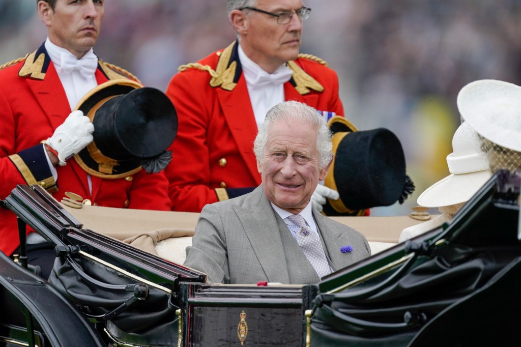 ASCOT, ENGLAND - JUNE 20: King Charles III travels down the course on day one during Royal Ascot 2023 at Ascot Racecourse on June 20, 2023 in Ascot, England. (Photo by Alan Crowhurst/Getty Images for Ascot Racecourse)