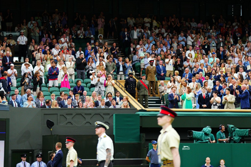 Mandatory Credit: Photo by Javier Garcia/Shutterstock (14001532z) Members of the 1st Battalion, Grenadier Guards - pallbearers at the funeral of Queen Elizabeth II (front row, left) are applauded by the Centre Court crowd Wimbledon Tennis Championships, Day 6, The All England Lawn Tennis and Croquet Club, London, UK - 08 Jul 2023